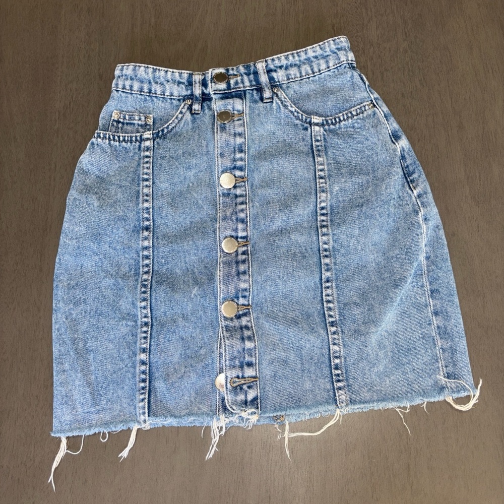 Super cute acid wash denim mini skirt with button detail